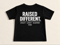 TRIBE Kids Raised Different Tee